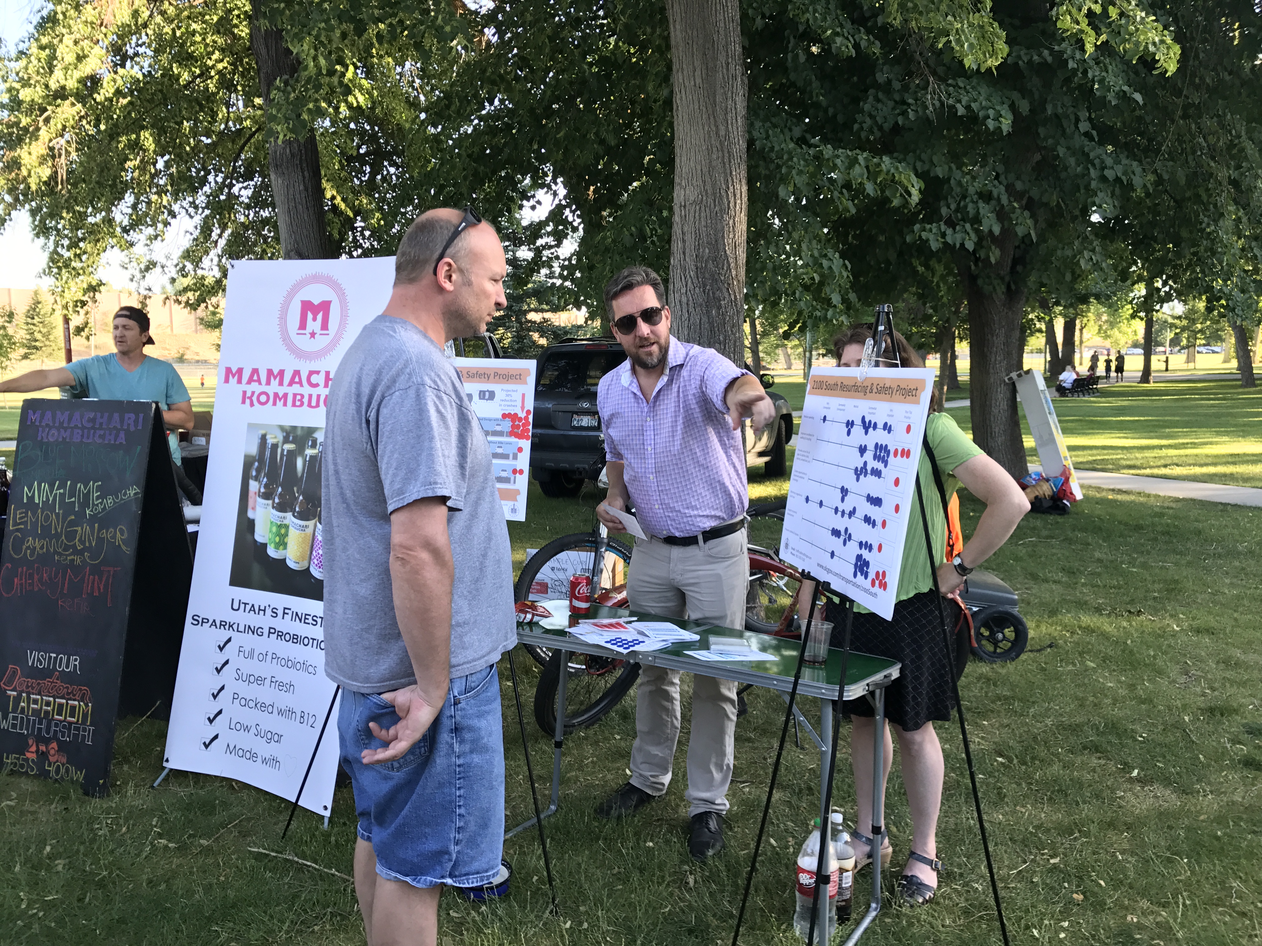 member of the public talking with City Staff