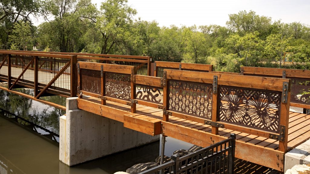 Brown bridge going across the river