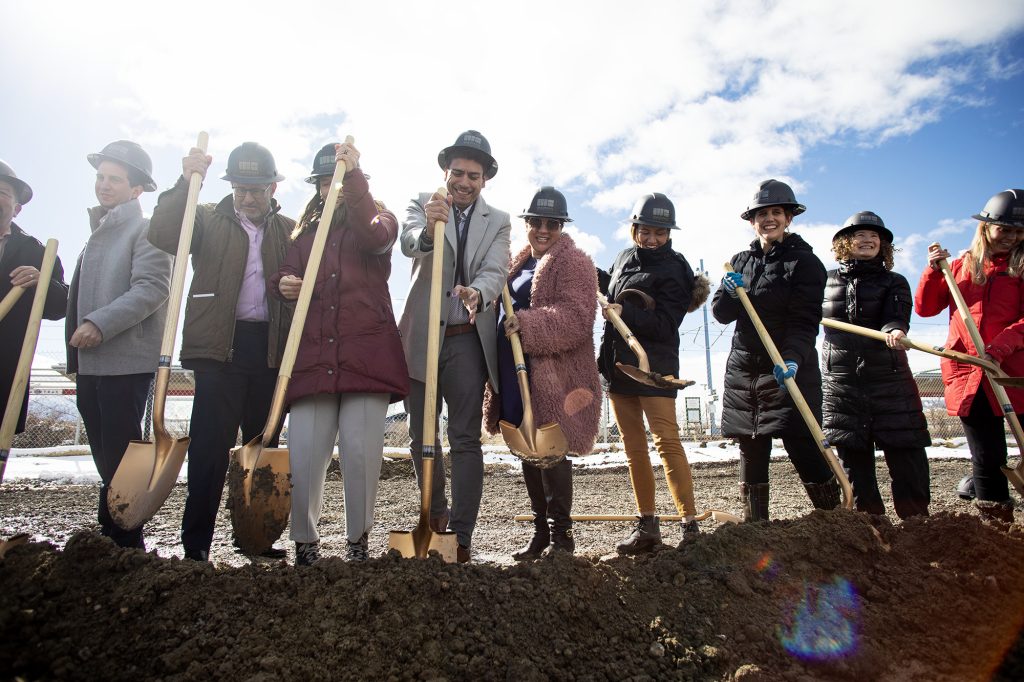 Salt Lake City Mayor Erin Mendenhall, District 2 Council Member Alejandro Puy, District 1 Council Member Victoria Petro, District 4 Council Member Ana Valdemoros, and other take part in the groundbreaking for the SPARK! Mixed Use Development project.