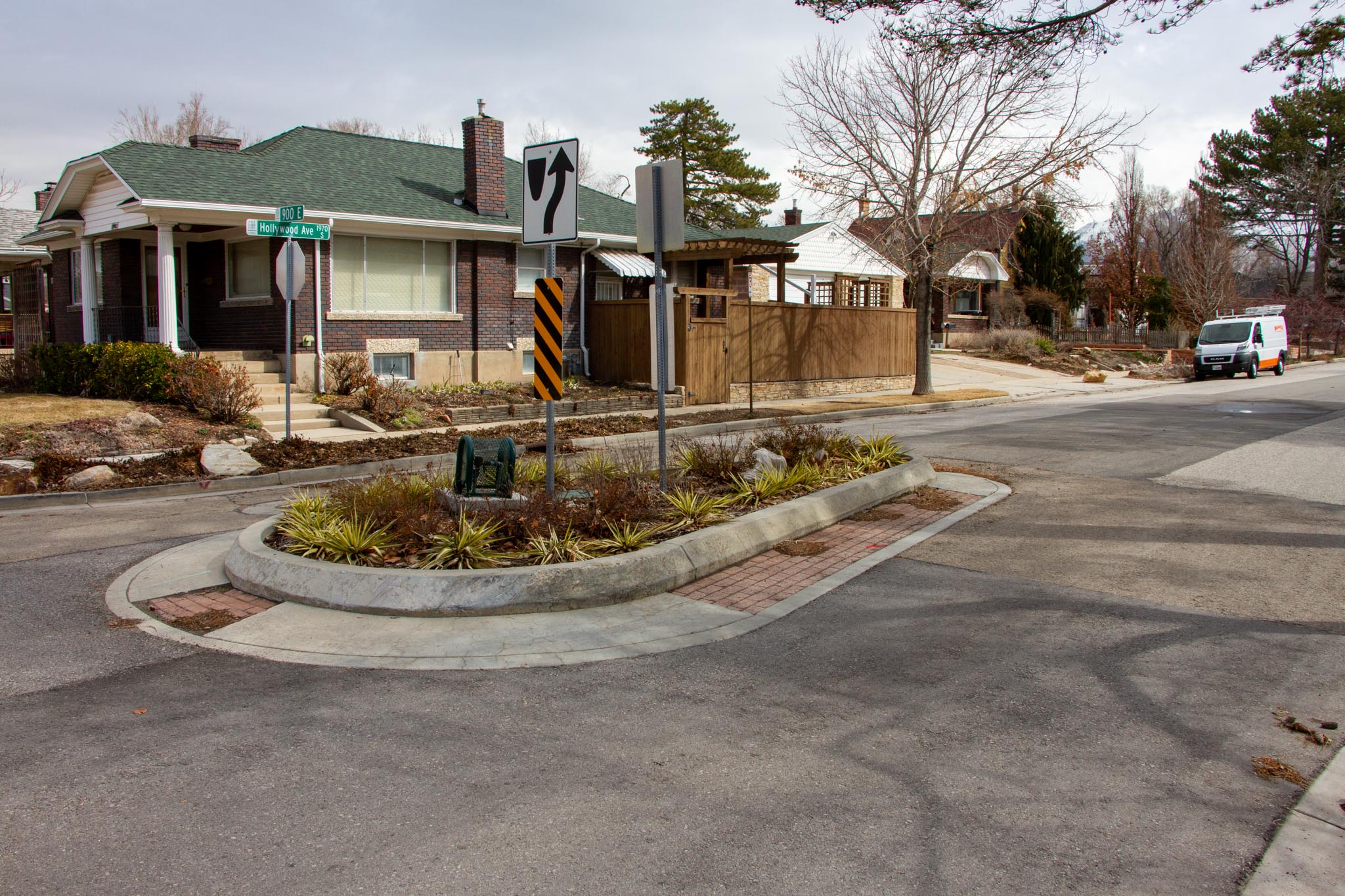 A planted median at the entrance to Hollywood Avenue helps calm traffic entering a residential neighborhood