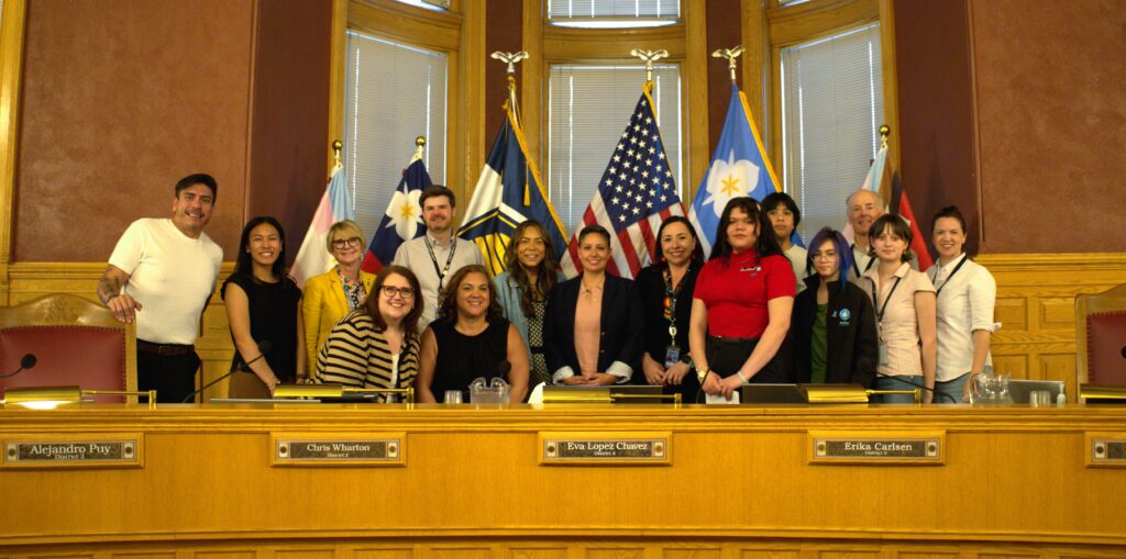 Council members with community members recognizing Start by Believing Day.