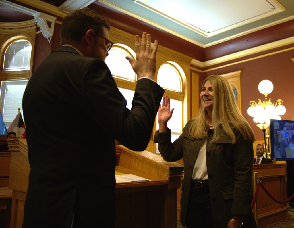 Jennifer Napier-Pearce being sworn in as the Salt Lake City District four council member. 