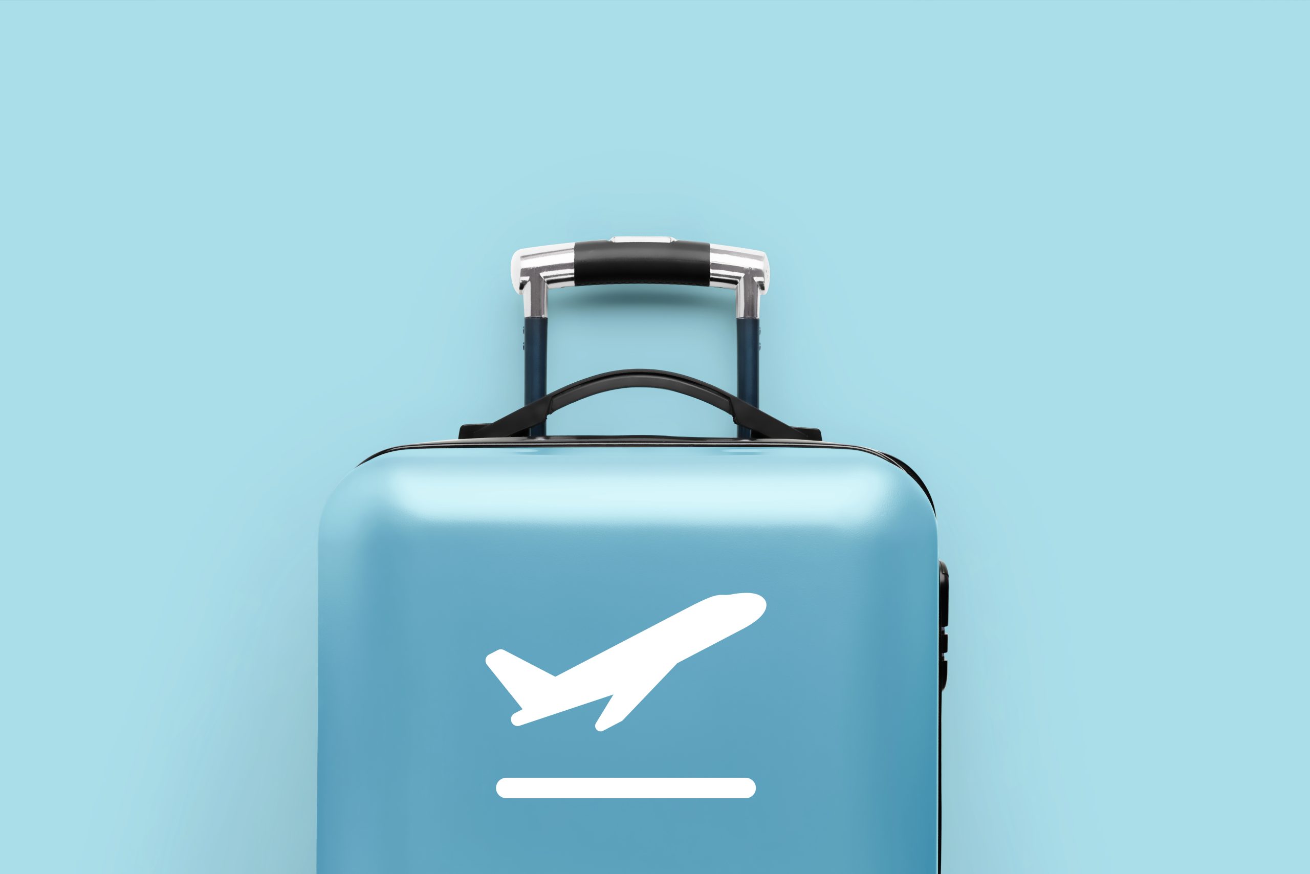 Luggage with airplane icon