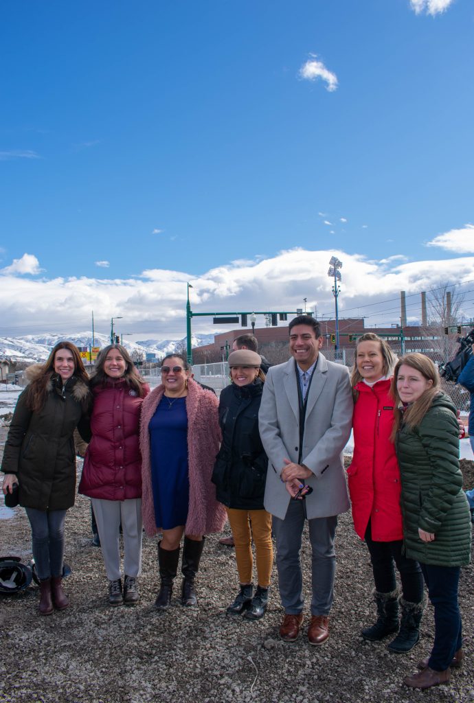 Salt Lake City Mayor Erin Mendenhall, District 2 Council Member Alejandro Puy, District 1 Council Member Victoria Petro, and District 4 Council Member Ana Valdemoros, pose with others the SPARK! Mixed Use Development project.