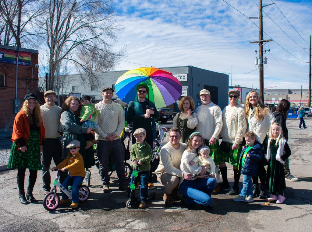 District 3 Council Member Chris Wharton posing with people at the parade.