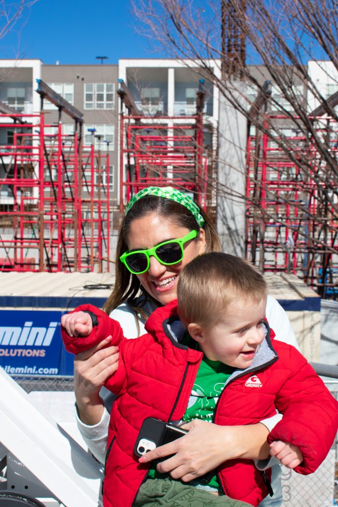 District 4 Council Member Ana Valdemoros holding her son on the fire truck.