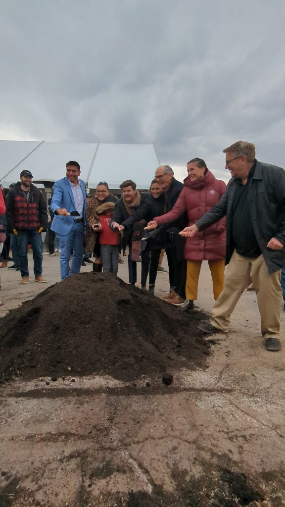 Salt Lake City Mayor Erin Mendenhall, District 1 Council Member Victoria Petro, District 2 Council Member Alejandro Puy, District 3 Council Member Chris Wharton, District 4 Ana Valdemoros, and District 6 Dan Dugen scooping dirt at the groundbreaking ceremony.
