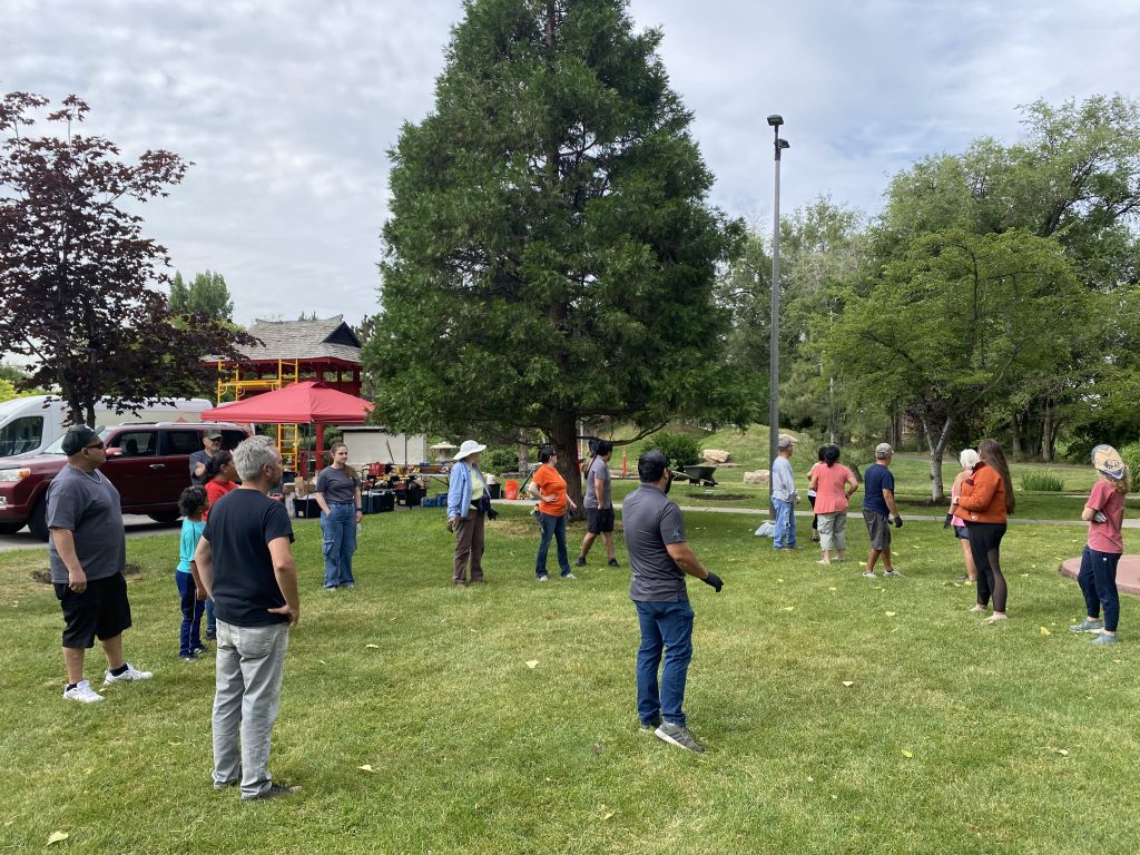 Community members discussing the restoration of the International Peace Gardens.