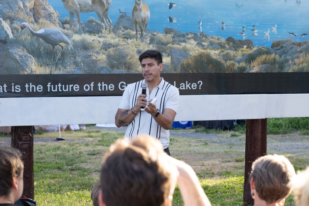 Council Member Puy speaking to crowd.
