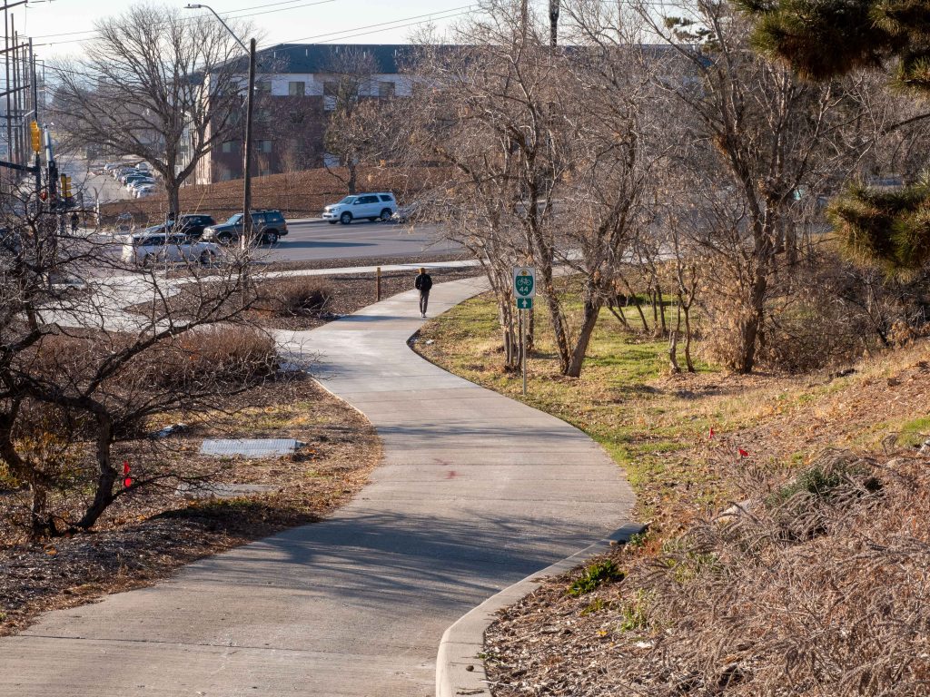 A photo of the shared-use path for people walking and biking at the intersection of Foothill Drive and Sunnyside Avenue.