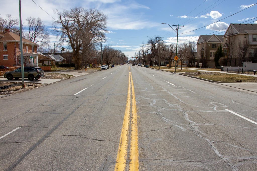 500 East looking south. A four lane road, with two vehicle travel lanes in each direction and a double yellow center line.