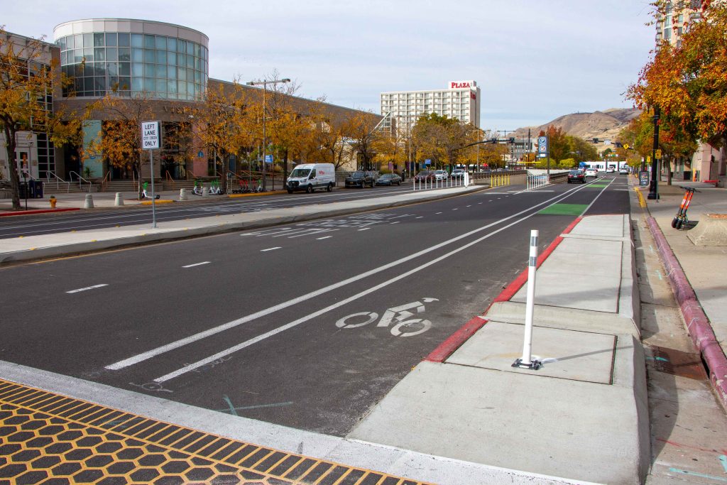 A picture of the new lane configuration and concrete medians at the intersection of 100 South and West Temple.