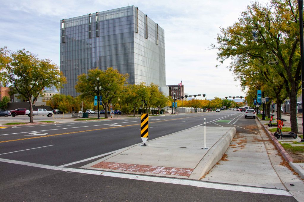 A picture of a bus boarding island at the intersection of 300 South and West Temple.