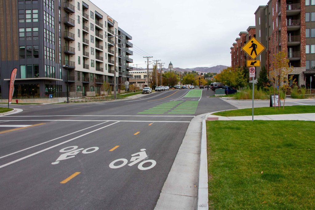 A picture of new asphalt and bike lanes on 300 North.
