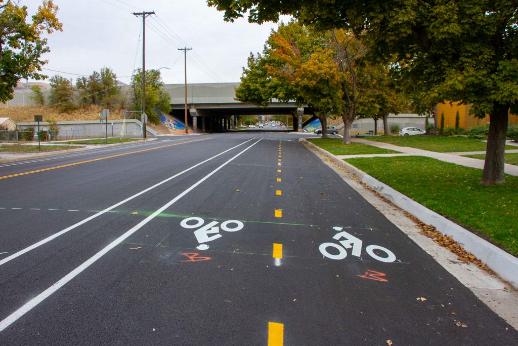 A picture of new asphalt and bike lanes on 300 North.