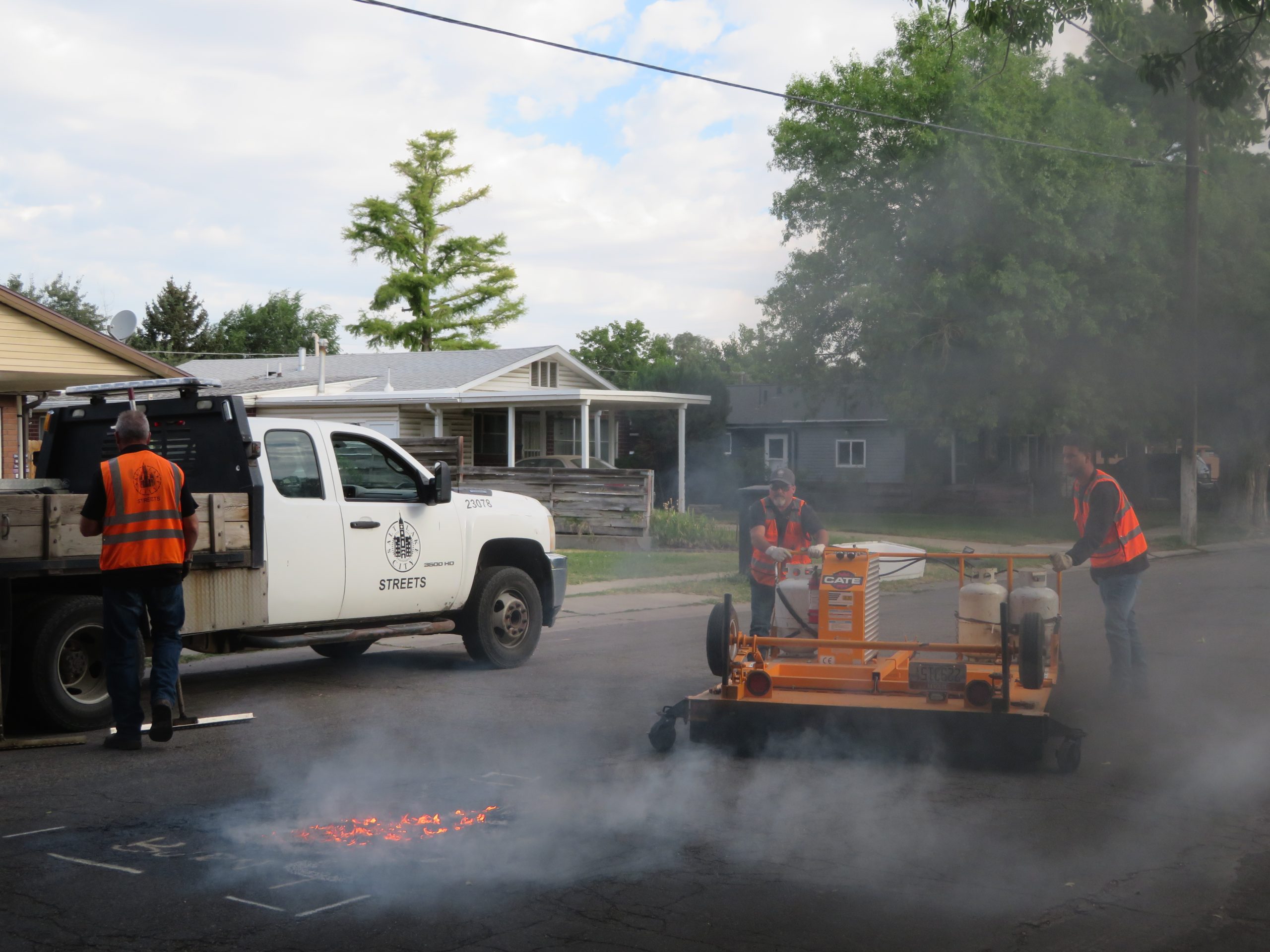 The road, which is heated up to 350 degrees, after the infrared reclaimer is removed. Sometimes the road heats so much, the asphalt begins to flame!