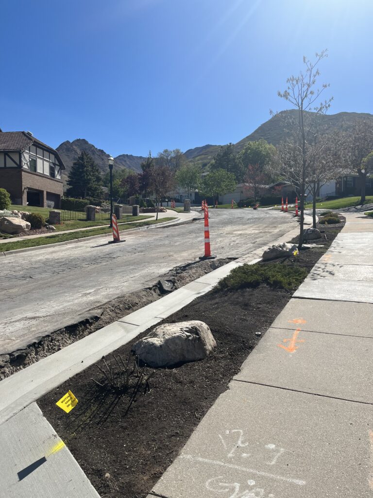 Picture of Chancellor Place prior to roadway reconstruction looking northeast up the hill from the bottom of the hill.