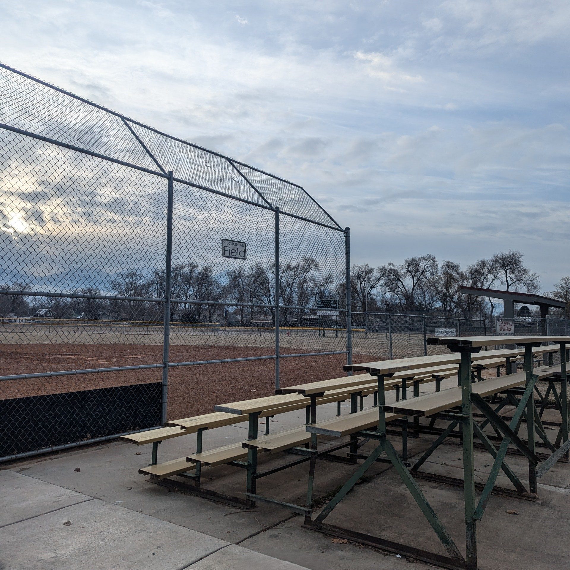 Photo shows a ball field and bleachers
