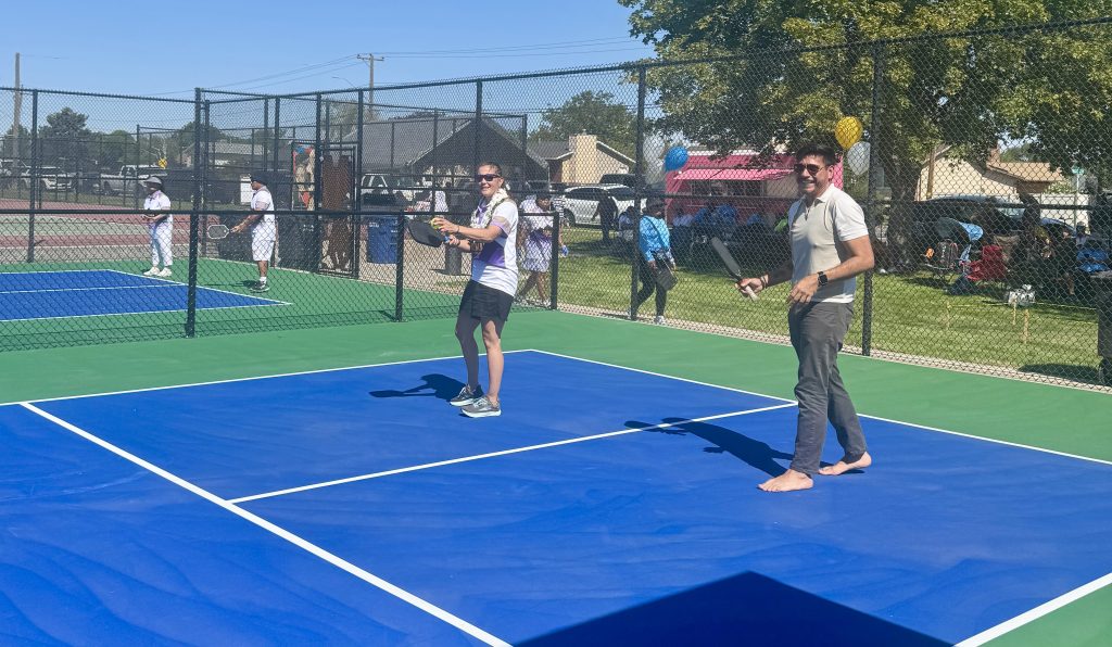 Mayor Mendenhall and Salt Lake City Council Member Alejandro Puy playing pickleball