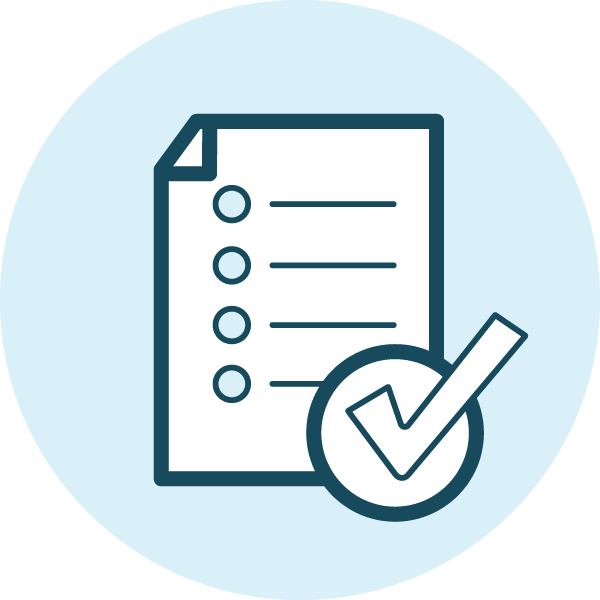 Checklist on a piece of paper, with a large check mark next to it.