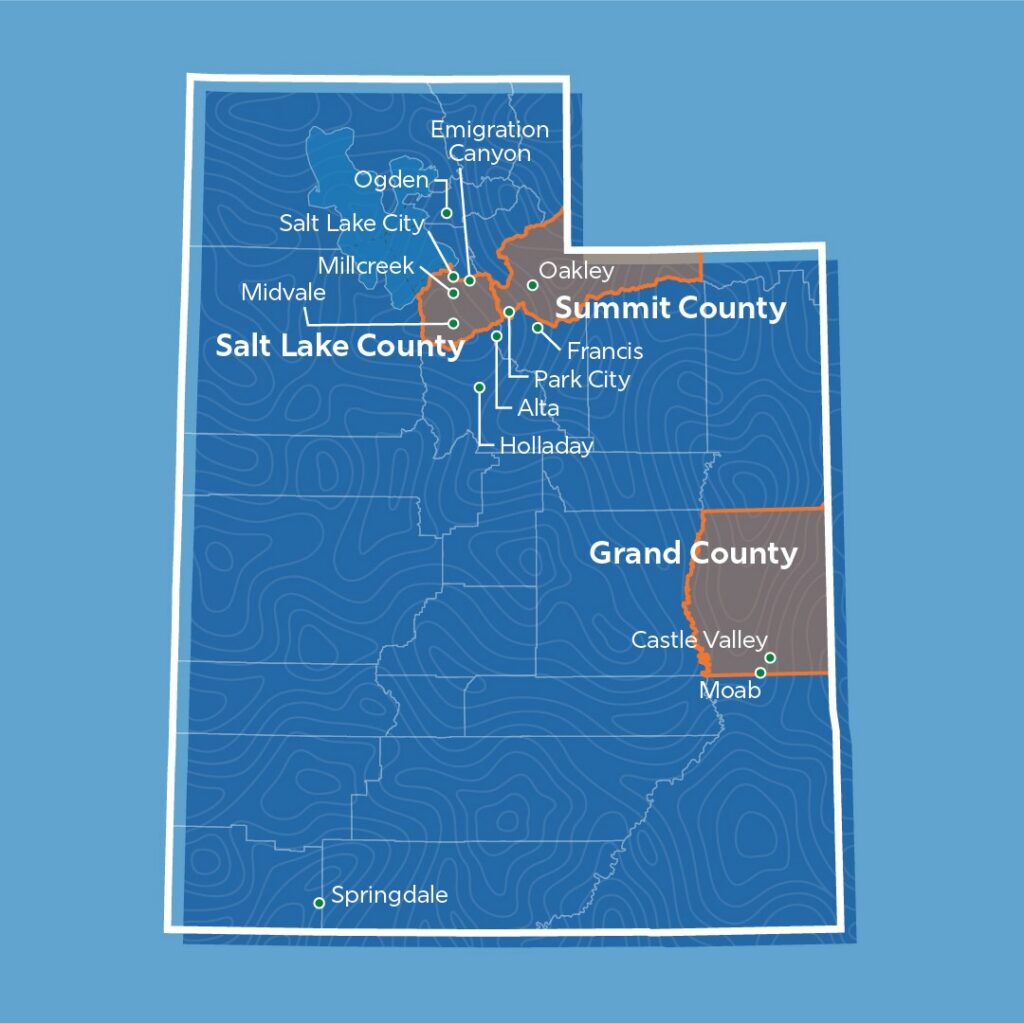A map of Utah showing the geographic dispersion of the 16 communities participating in the Community Clean Energy Program. The 16 communities are labeled on the map, including Ogden, Oakley, Francis, Park City, Summit County, Salt Lake County, Alta, Emigration Canyon, Millcreek, Midvale, Salt Lake City, Holladay, Grand County, Castle Valley, Moab, and Springdale.