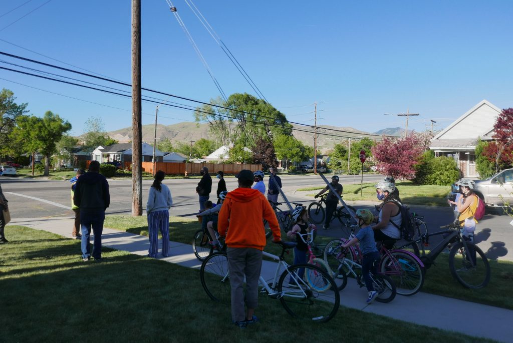 A picture of a group of people gathered to discuss various transportation projects happening along 1000 West.