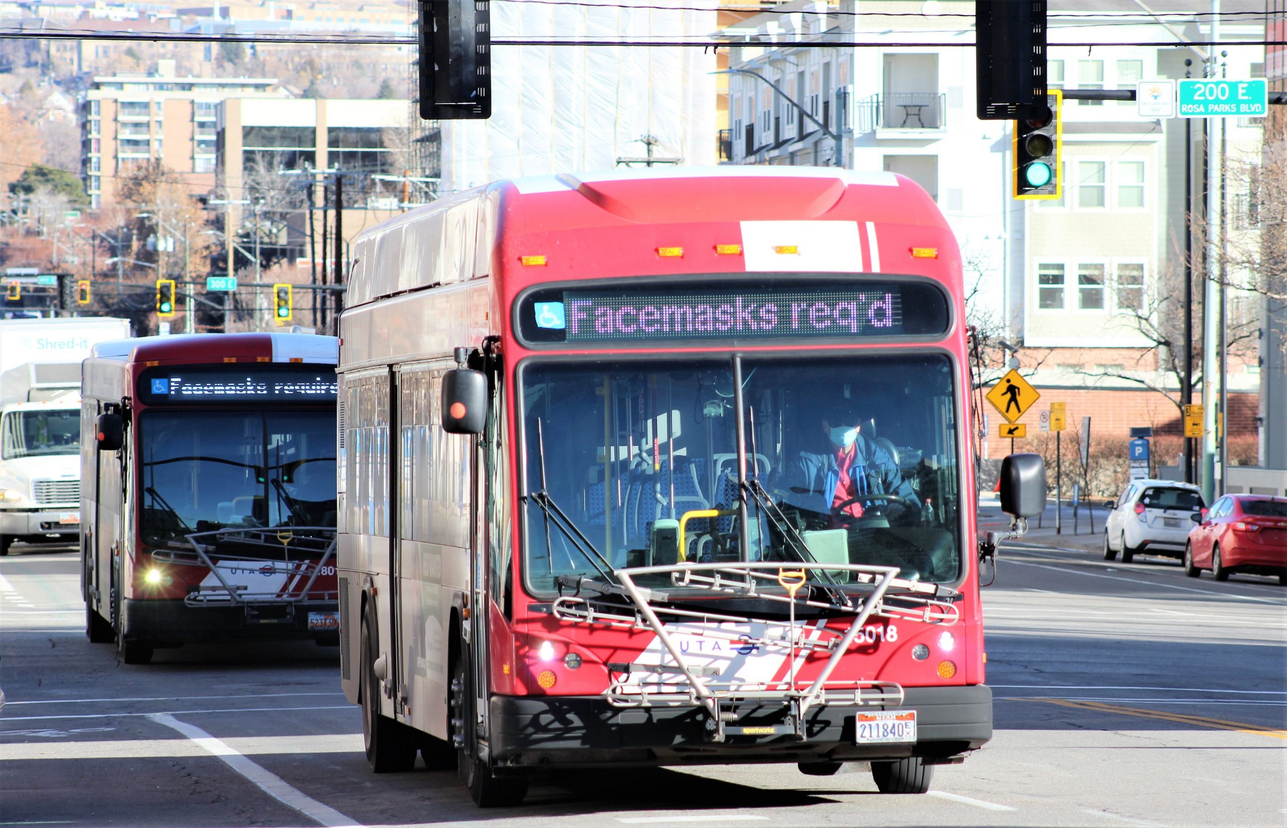 A UTA bus and masked driver during COVID-19.