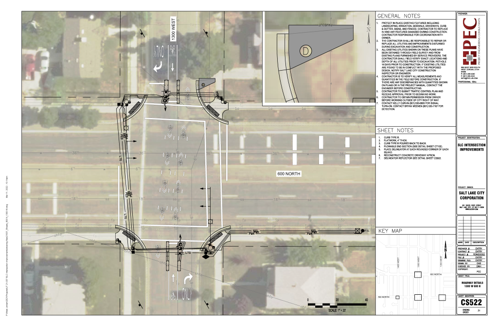 A diagram of the 600 North and 1300 West intersection design. North and southbound vehicles are forced to turn right onto 600 North by two concrete curbs in the roadway. The curbs are located on both the north and south parts of the intersection and have a push button for cyclists to trigger a red light for motorists on 600 North. Painted bicycle sharrows are used throughout the intersection to direct cyclists and alert drivers. 