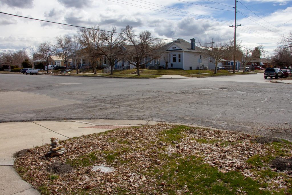 Existing conditions at the intersection of 1000 West and 700 South. A very wide street in a residential neighborhood.