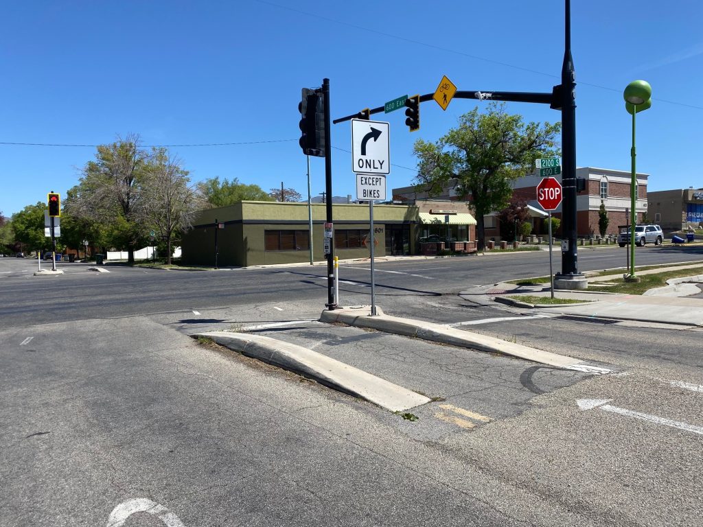 A Toucan signal at the intersection of 600 East and 2100 South. There is no northbound or southbound through access; drivers to make a
