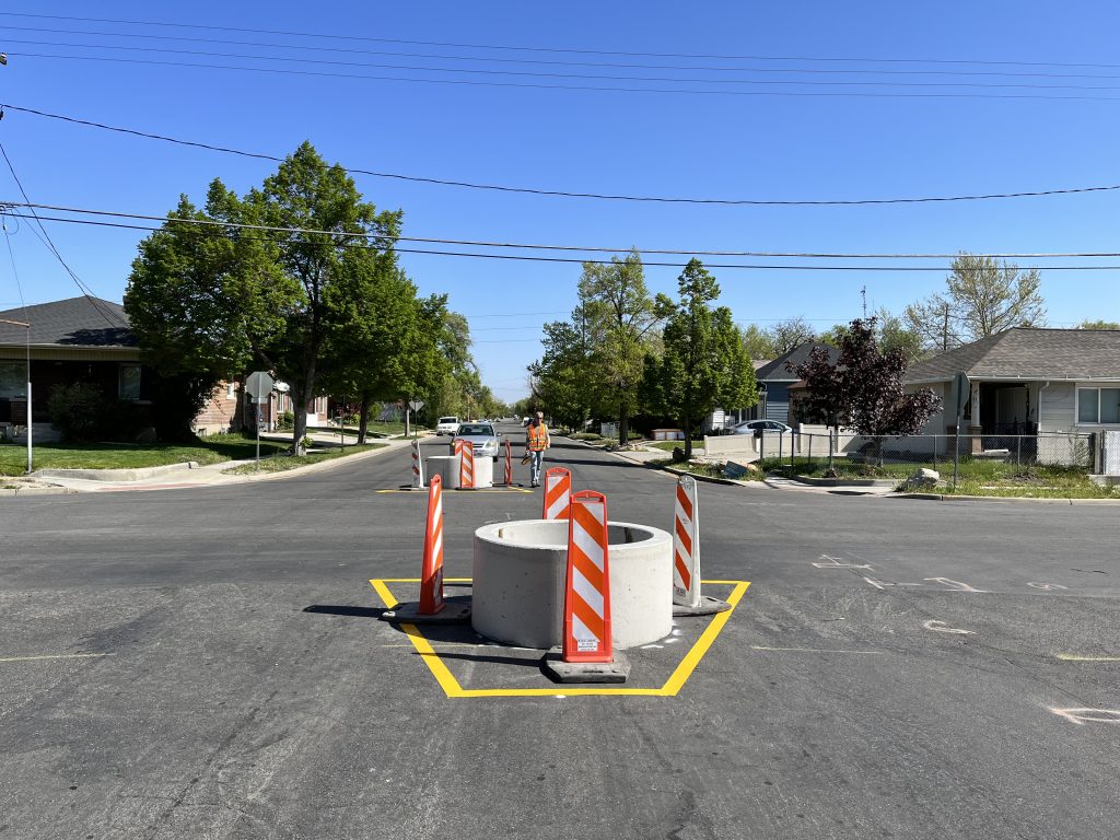 A picture of temporary traffic calming rings in the middle of a street.