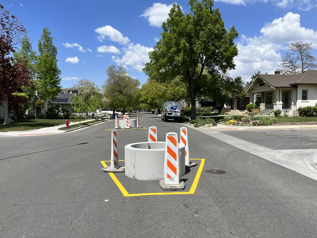 A picture of temporary traffic calming rings in the middle of a street.
