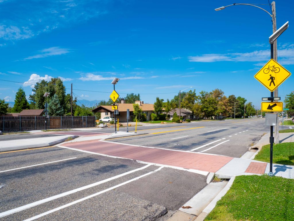 A picture of the enhanced crosswalk at Stringham Avenue and Parley's Way.