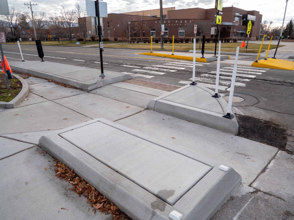 A picture of the enhanced crosswalk at 1000 North and Capistrano Drive.