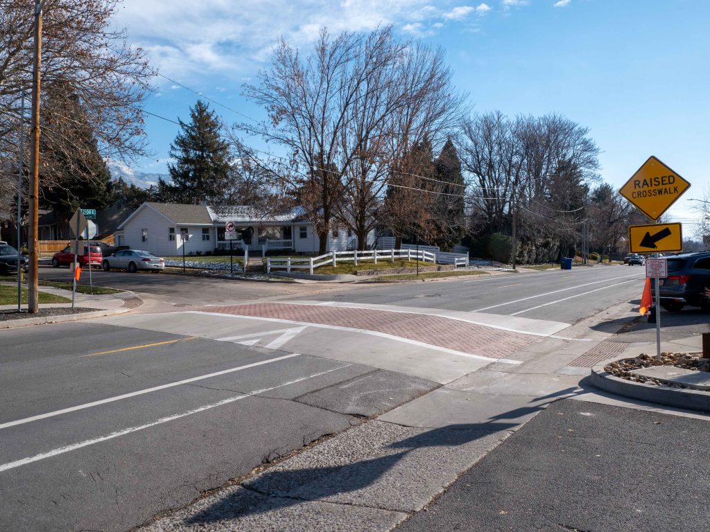 A photo of a raised crosswalk on 2100 East.