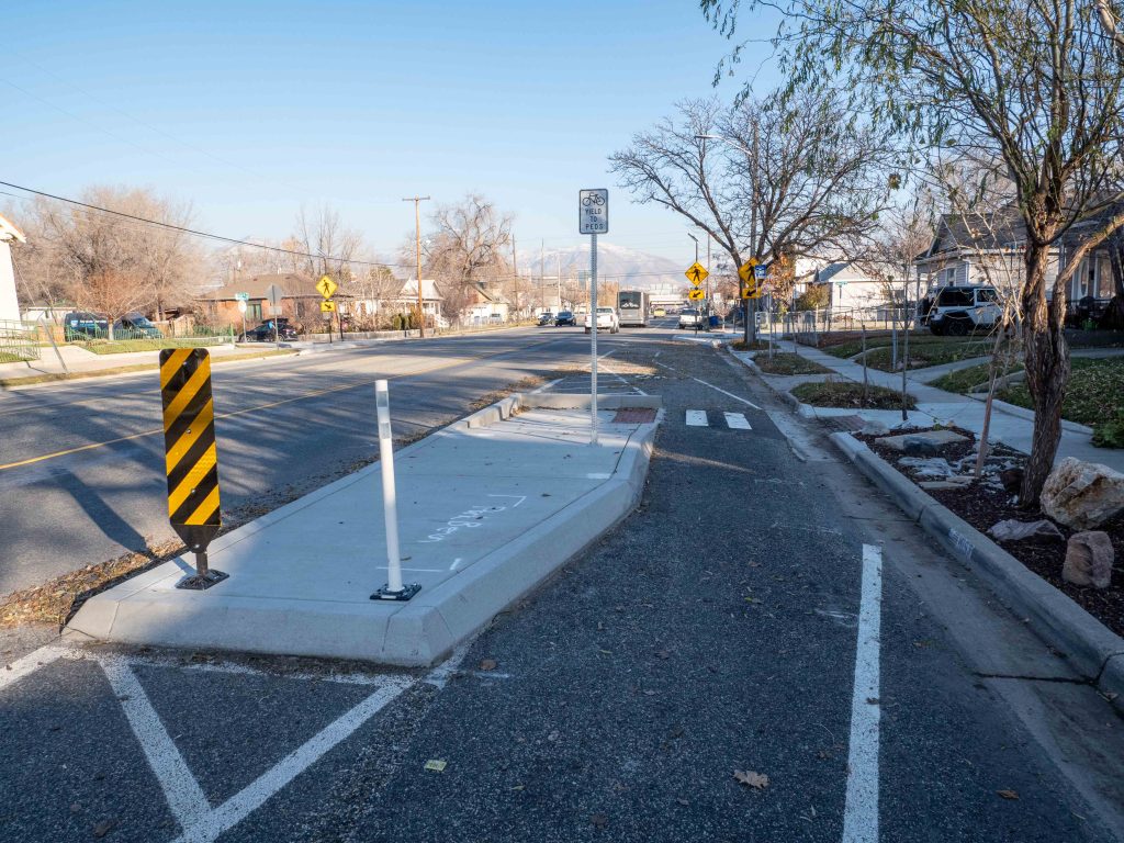 A photo of a bus boarding island on 400 South.