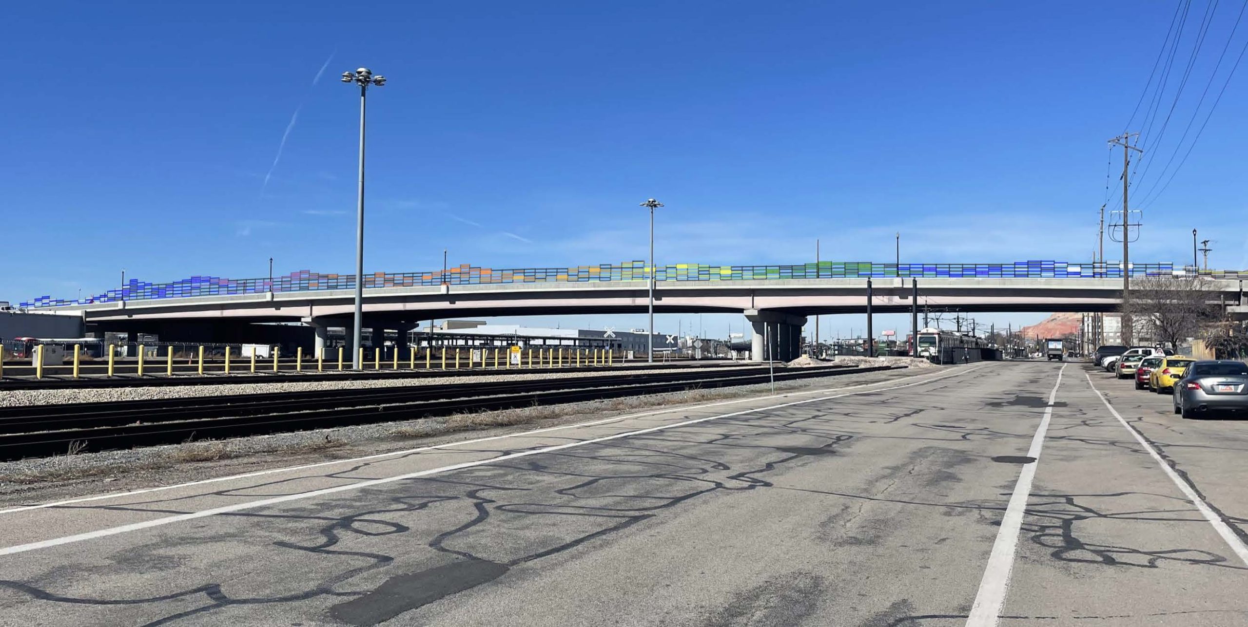 A rendering of a colorful piece of art spanning the 400 South bridge.